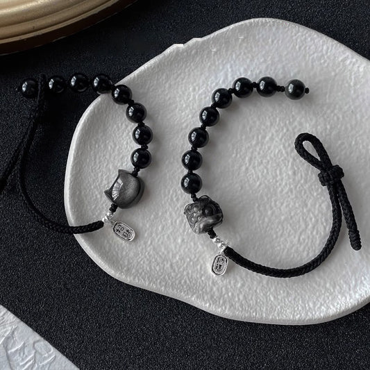 Natürliches Obsidian Löwentanz Armband|Silberner Katzenanhänger|Edles Schutzarmband|Handgeflochtenes Energie-Accessoire obsidian natur naturally occurring obsidian