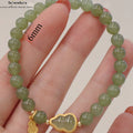 Unisex Hetian Jade Armband  mit 925 Gold & Glückskalebasse