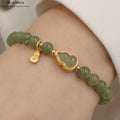 Unisex Hetian Jade Armband  mit 925 Gold & Glückskalebasse