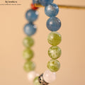 Xiuyan-Trauben Milchschaum Armband | Vintage Aquamarin Jahresenergie | Schneequarz & Nan Hong