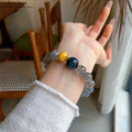 Natürlicher Graumondstein Blau/Gold-Tigerauge ArmbandEdles Kristall-Energie Armband