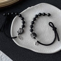 Natürliches Obsidian Löwentanz Armband｜Silberner Katzenanhänger｜Edles Schutzarmband｜Handgeflochtenes Energie-Accessoire obsidian natur naturally occurring obsidian
